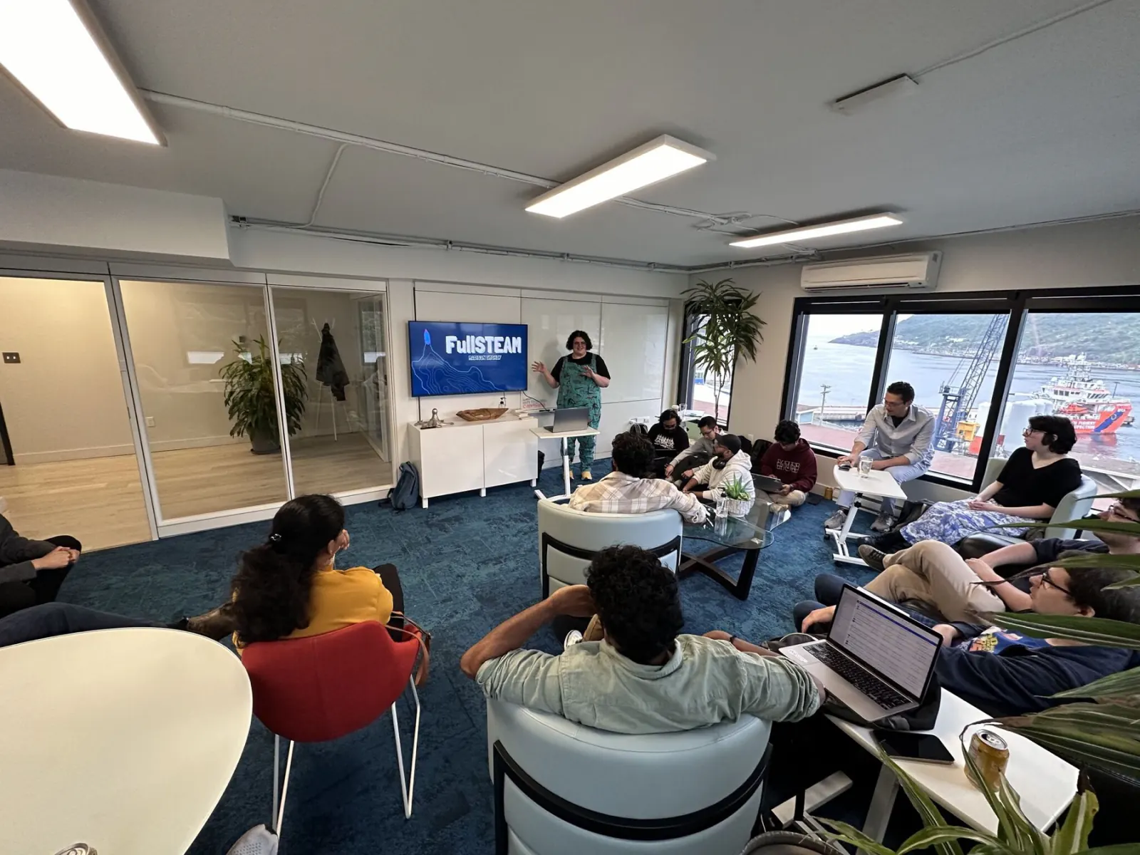 A speaker presenting at a Get Building tech talk