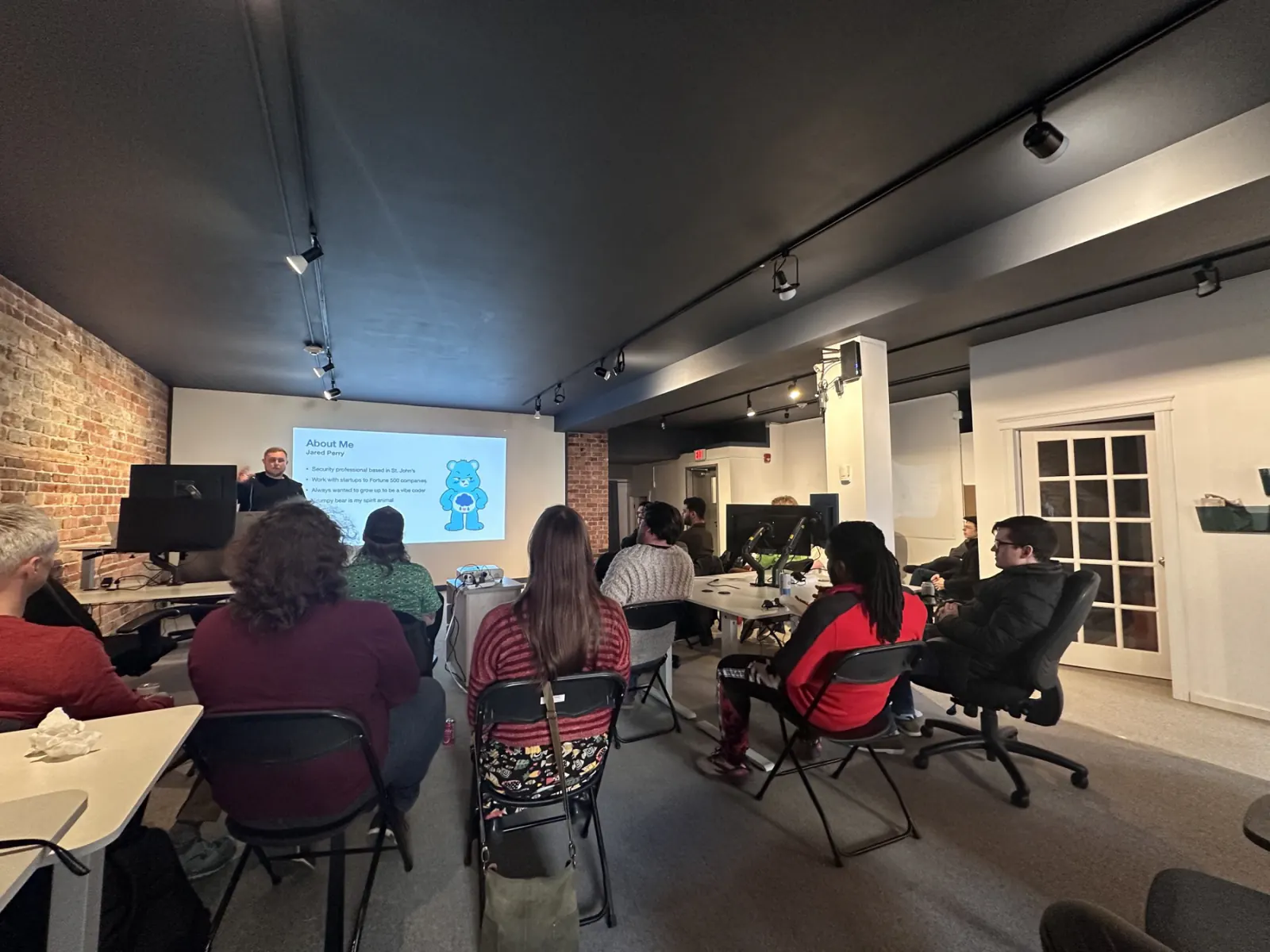 A security professional presenting to a full room at the Get Building space
